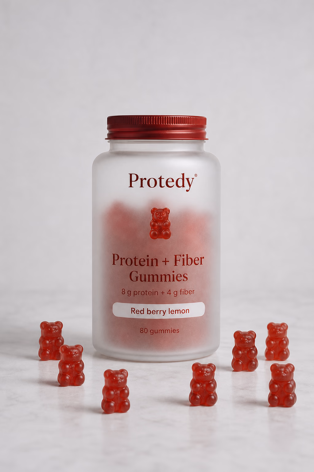 Frosted PROTEDY Protein and Fiber Gummies bottle with ruby gummies